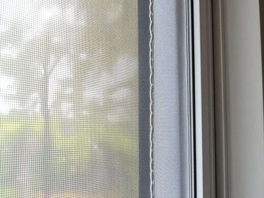 New tight screen mesh in a clean screen frame on the same window